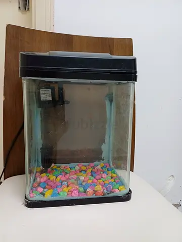 Small used desktop aquarium with filter and colored gravel