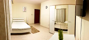 Furnish room available for one or two executive bachelors in Al khail gate 2