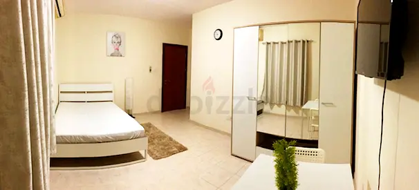 Furnish room available for one or two executive bachelors in Al khail gate 2