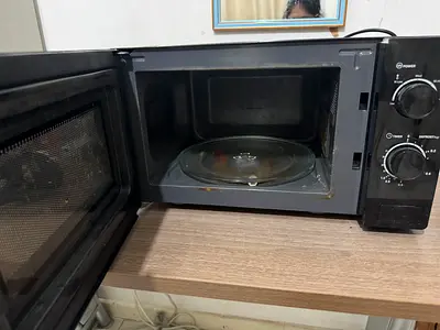 Used Black Countertop Microwave Oven - Works Fine