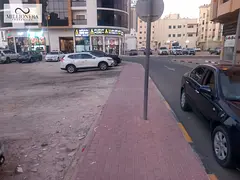 For sale: Residential/investment plot in Ajman, ground floor and 4-meter building permit