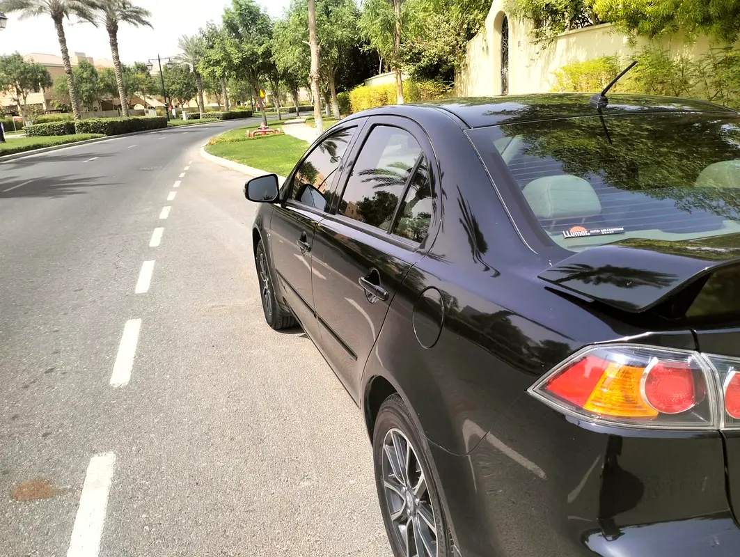 Mitsubishi Lancer 2016 — photo 1 of 3
