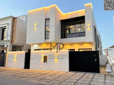 Own your dream two-story villa in Al Yasmin area, next to Al Hamidiya Park, directly from the owner with no down payment and bank financing available.