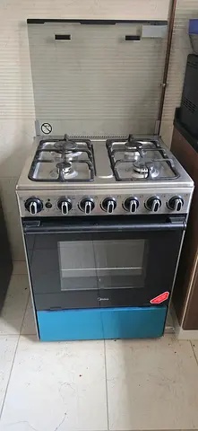Used 4-Burner Gas Cooker with Oven — Good Working Condition