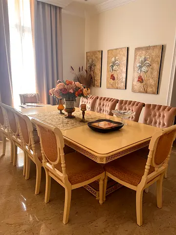 Classic cream wooden dining table with 8 upholstered chairs - good condition