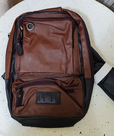 Brown Leather-look Compact Sling Backpack / Crossbody Bag - Good Condition