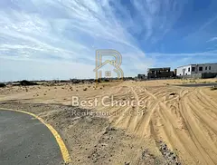 Residential Commercial Land in Al Ruwaidat – On a Main Road