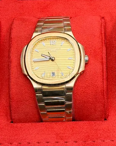 Patek Philippe Nautilus 7118/ Gold-tone Men’s Wristwatch with Date Display –Stainless Steel Bracelet