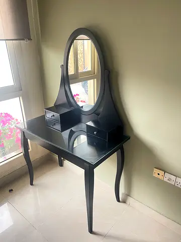 Black Wooden Dressing Table with Oval Mirror, chair and Drawers. Ikea excellent condition