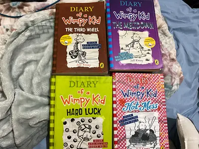 Diary of a Wimpy Kid collection — 4 paperback books (Third Wheel, The Ugly Truth, Hard Luck,)