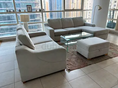Beige L-Shaped Corner Sofa set with 2 Seater sofa and Ottoman — Good Condition