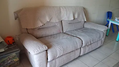 2 Seater Beige Fabric Sofa - Comfortable, Good Condition