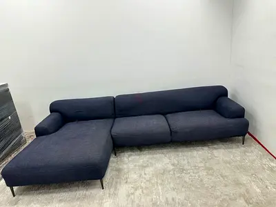 Like new condition the loom collection lshape sofa
