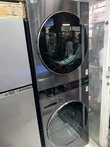 LG Stacked Washer and Dryer Set - Silver, Front Load (Good Condition)