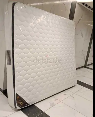 Queen Size Mattress - New, Wrapped in Plastic