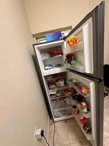 Used Double-Door Refrigerator in Working Condition