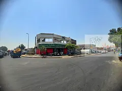 Prime location within the scrap market, corner of two paved streets