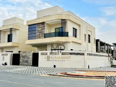 Villa (corner) for sale in Ajman | Al Helio 2 area | 5 rooms, majlis, 2 halls and roof | Freehold ownership for all nationalities | Price includes reg
