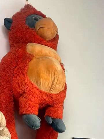 Large orange plush stuffed animal monkey - gently used
