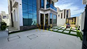 Own your dream corner villa in the heart of Ajman, two floors and a roof, next to services, includin