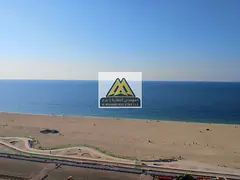 A luxurious apartment for annual rent in Corniche Towers, featuring a very spacious layout and a ful