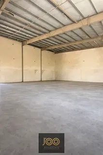 8000 sqft warehouse UAQ mezzanine 100KW AED 310K two main roads offices ready