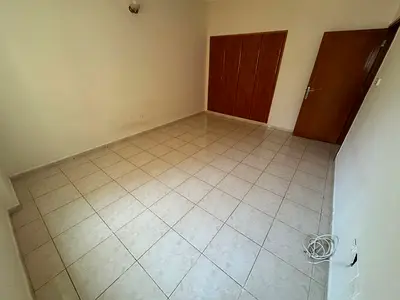 The most luxurious two-bedroom apartment in Al Qasimia, in a prime location near Crystal Plaza. Features include air conditioning and free parking. A
