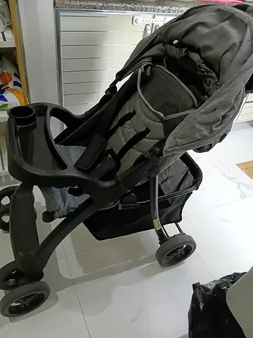 Lightweight grey single baby stroller with storage basket