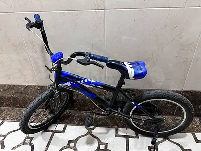 Used kids 18-inch blue bicycle - good working condition