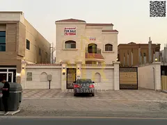 Luxury villa for sale in Al Muwaihat 1 on the main road | 5,000 sq ft | Two floors + roof | 5 master