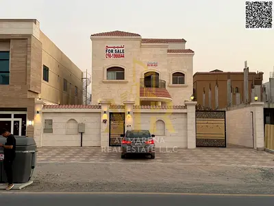 Luxury villa for sale in Al Muwaihat 1 on the main road | 5,000 sq ft | Two floors + roof | 5 master bedrooms | Majlis and living room | Modern kitche