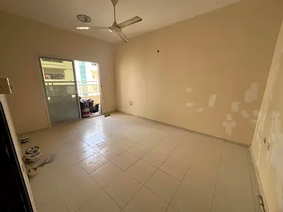 Luxury apartment next to Al Hikma School, with a large area and a balcony with an excellent view_27,000 AED