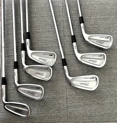 Used set Titleist CB forged Irons, Hybrid 910H, Wood 910F - Driver 910D Stiff/RH New Grips