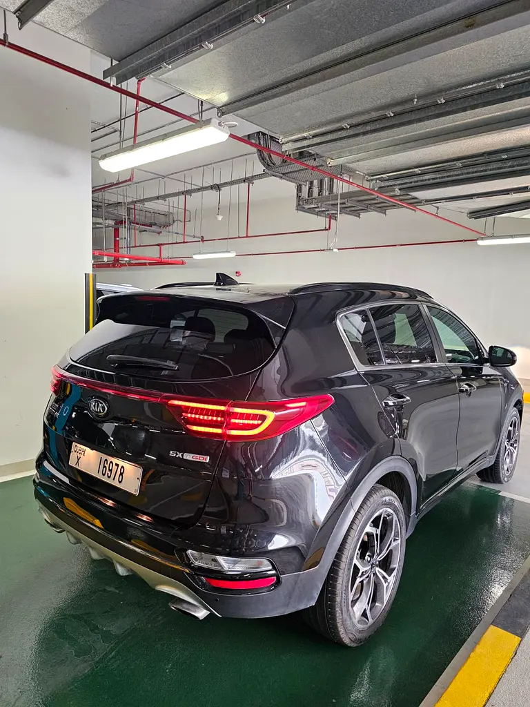 Kia Sportage 2021 — photo 1 of 8