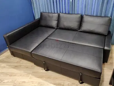 Black Leather L-Shaped Sofa Bed with Storage - Good Condition
