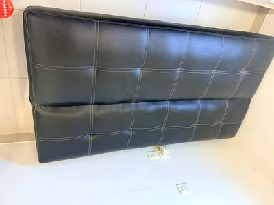 Black faux-leather foldable sofa bed / futon in MINT condition