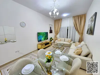 Two-bedroom apartment with a living room, fully furnished with new furniture, available for monthly rent in Ajman - Al Jurf 2 - Al Yasmin Towers