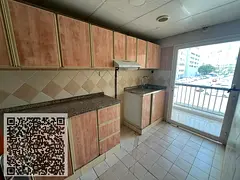 Two-bedroom apartment with a living room for annual rent in Abu Shagara area, Sharjah, at a cheap pr