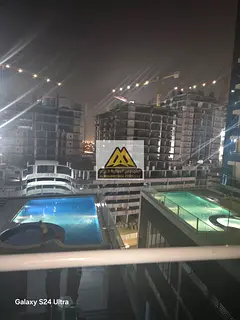Pool View Apartment with Gym Garden and Parking in Al Waha Towers Ajman Prime Residential Location