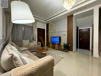 A villa with all electricity, water and air conditioning fees included, on the main street, ready to move in, in the most prestigious areas of Ajman,