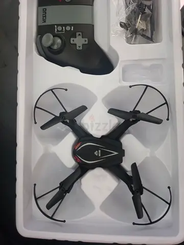 Compact quadcopter drone with controller - barely used