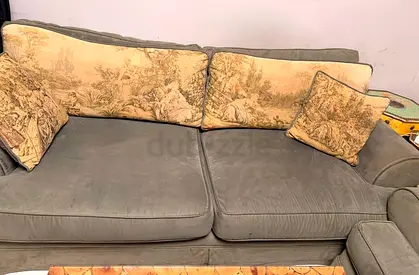 Comfortable 3-Seater Grey Velvet Sofa with Decorative Cushions