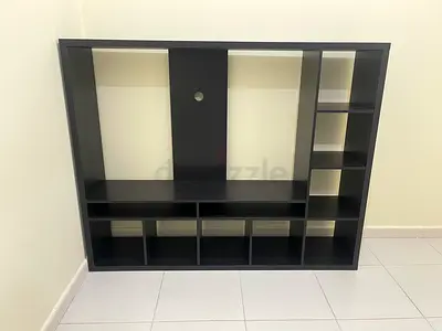 Ikea black TV table Unit with Shelves. Pick up from khalifa city.