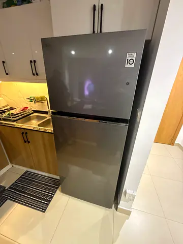 Used double-door refrigerator in good condition - 2 doors, metallic finish