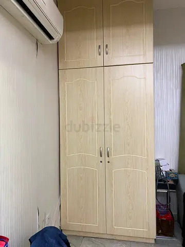 Light wood 6-door wardrobe / armoire in good condition