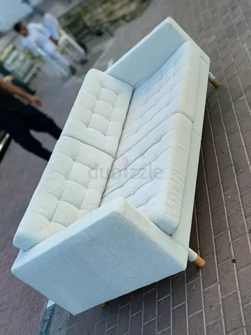 Light grey 3-seater fabric sofa with wooden legs