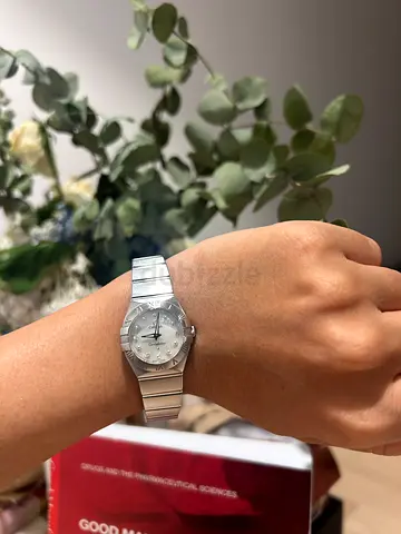 Ladies stainless steel Omega constellation with mother of pearl dial , 12 diamonds
