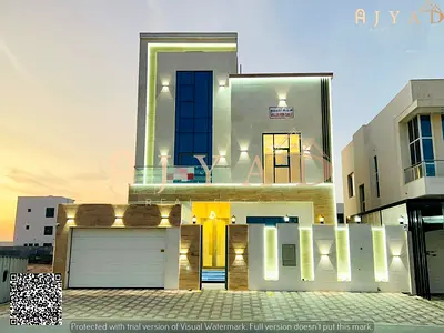 For sale: modern villa in Al Bahia Ajman, 2 floors + roof, 6 master bedrooms, majlis, 3 living room