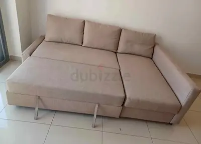 Light Beige L-Shaped Sofa Bed — Convertible, Good Condition