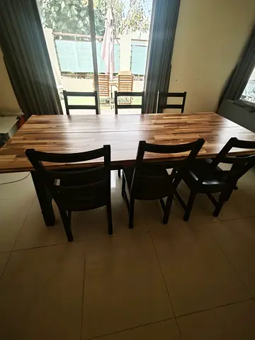 Solid wood dining table with 6 chairs - good condition